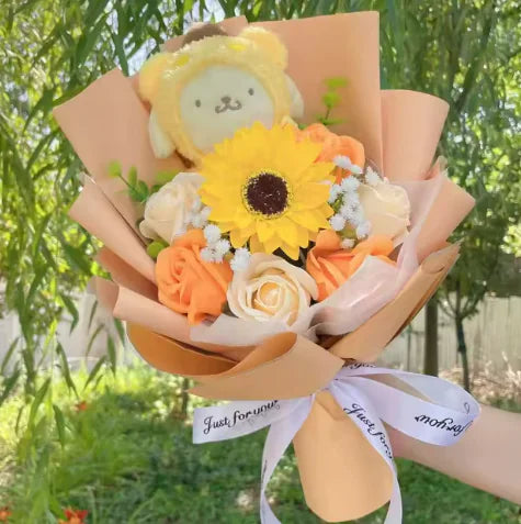 Elegantes Geschenkset aus Plüsch und Blumen